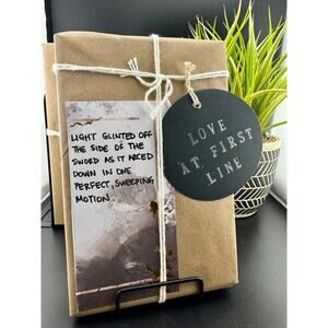 Love At First Line Book "Light glinted off the side of the sword..."